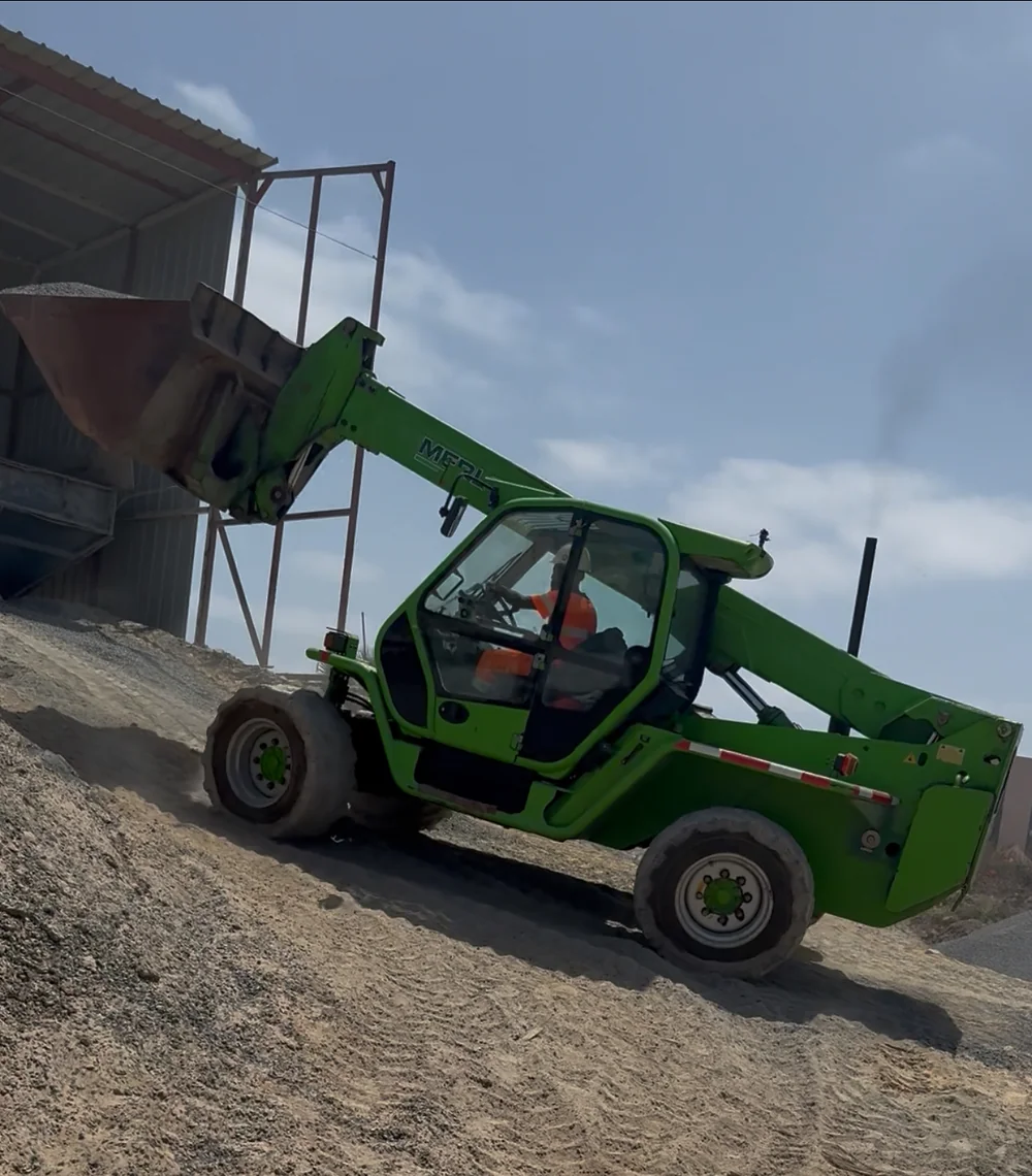 Merlo telehandler with bucket handling aggregates