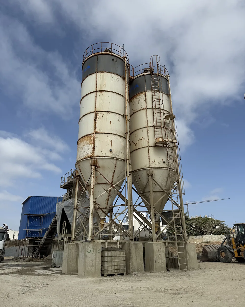 Corroded cement silos before work